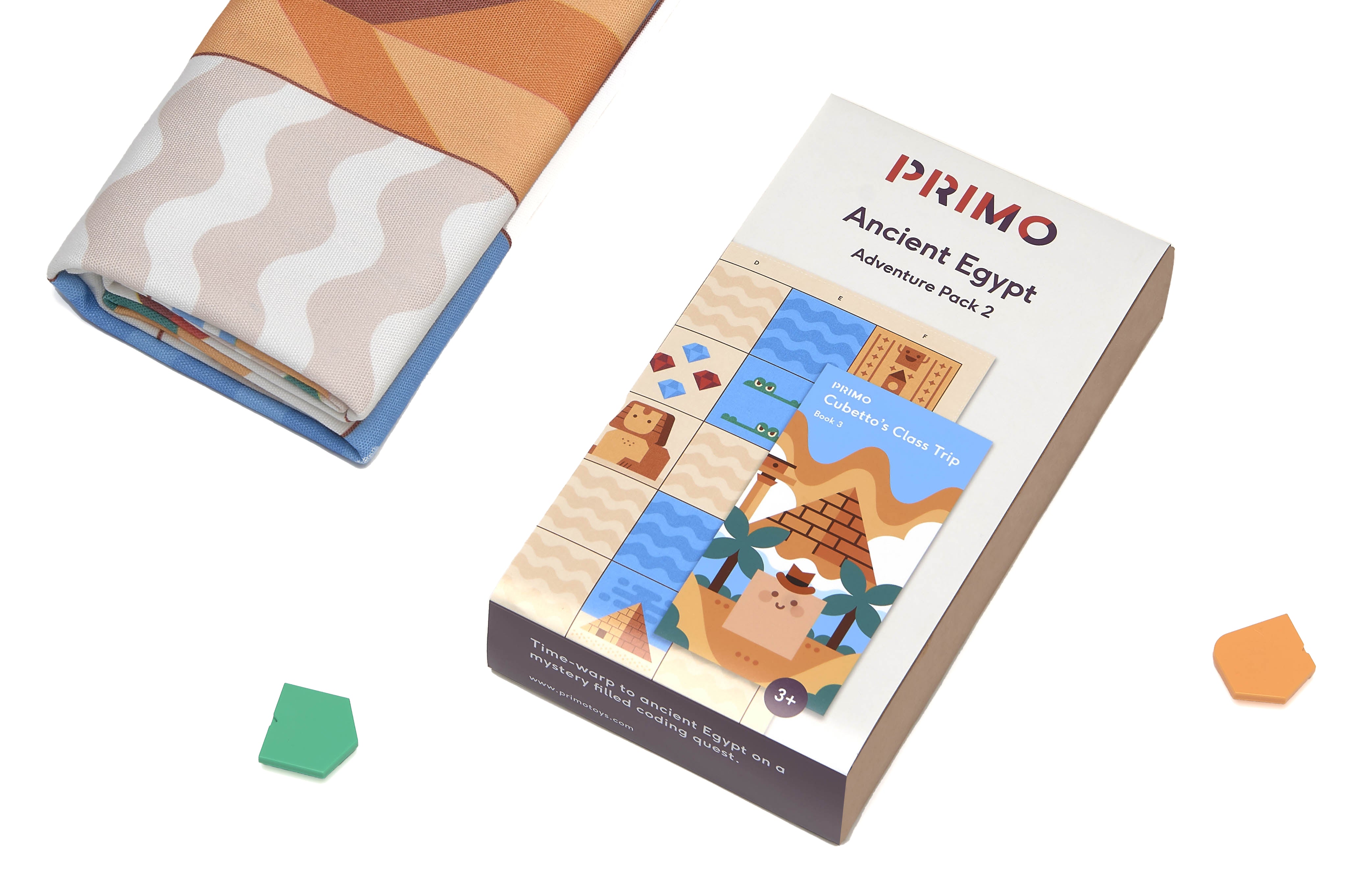 Zestaw "Mapa do robota Cubetto - Odkrywcy Starożytności: Egipska Przygoda" zawiera szczegółowo zaprojektowaną mapę przedstawiającą starożytny Egipt oraz książeczkę z opowiadaniami, pełną zagadek i wyzwań. Mapa służy jako plansza do zabawy dla robota Cubetto, umożliwiając dzieciom programowanie ruchów robota, aby odkrywać skarby, piramidy i hieroglify.